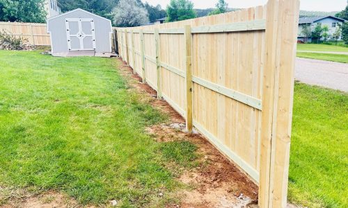 Wooden fencing in yard